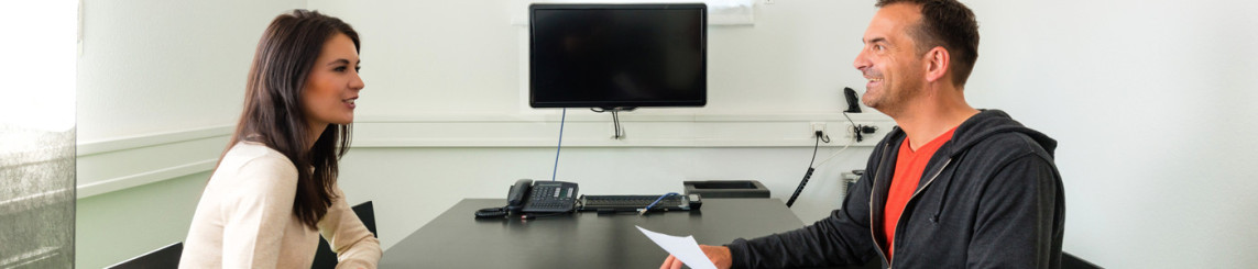 Man and woman interviewing for job